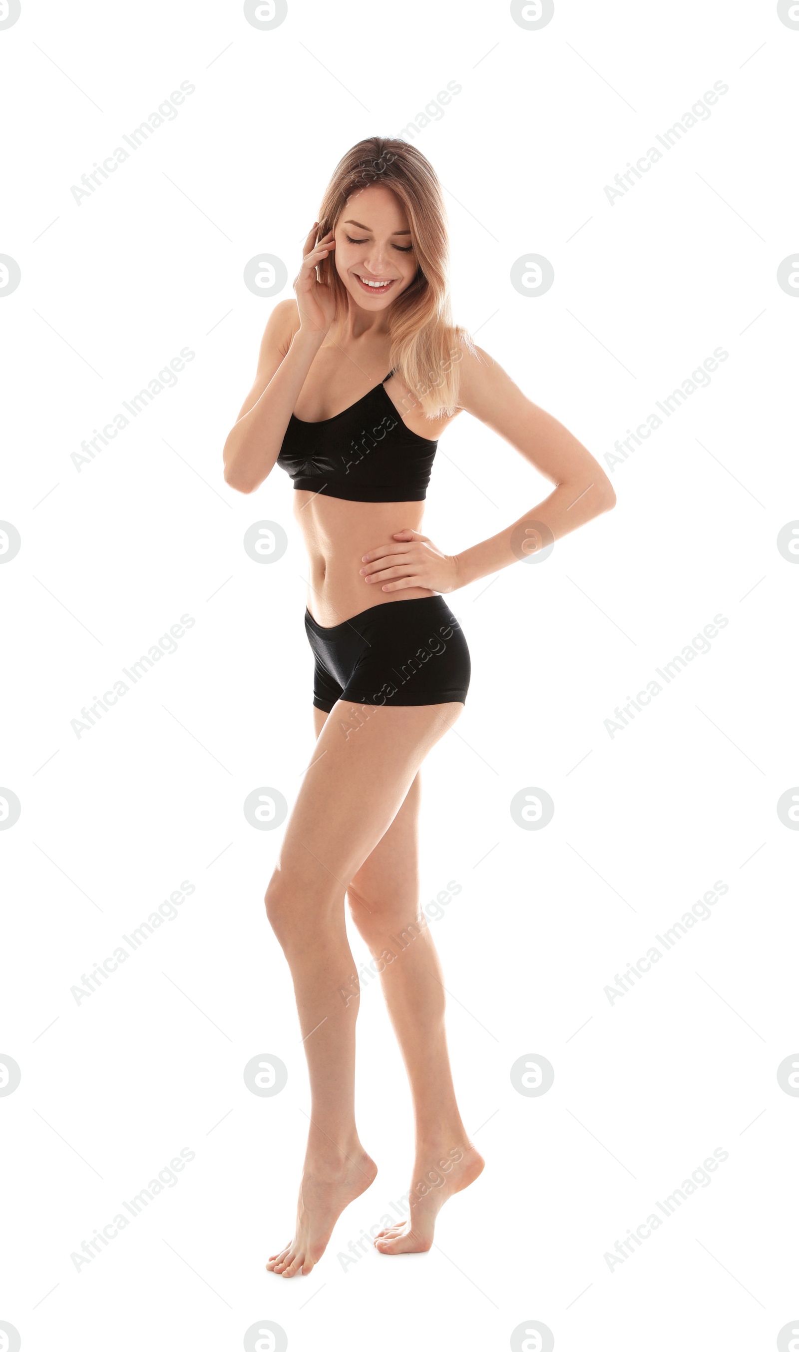 Photo of Young slim woman on white background. Perfect body