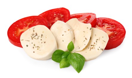 Photo of Delicious Caprese salad with tomatoes, mozzarella cheese, basil leaves and herbs isolated on white