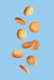 Image of Set of falling delicious shortbread cookies on blue background