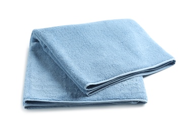 Photo of Fresh soft folded towel isolated on white