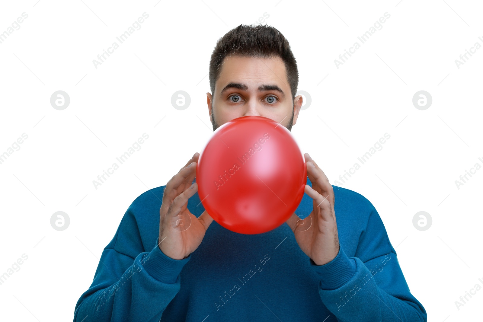 Photo of Man inflating bright balloon on white background