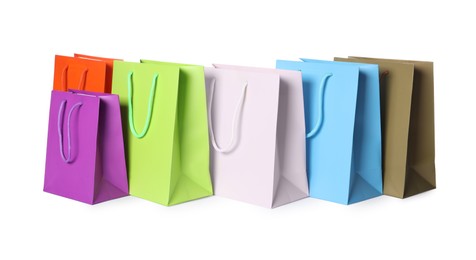 Colorful paper shopping bags isolated on white