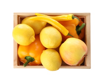 Photo of Wooden crate full of fresh ripe fruits and vegetables on white background, top view