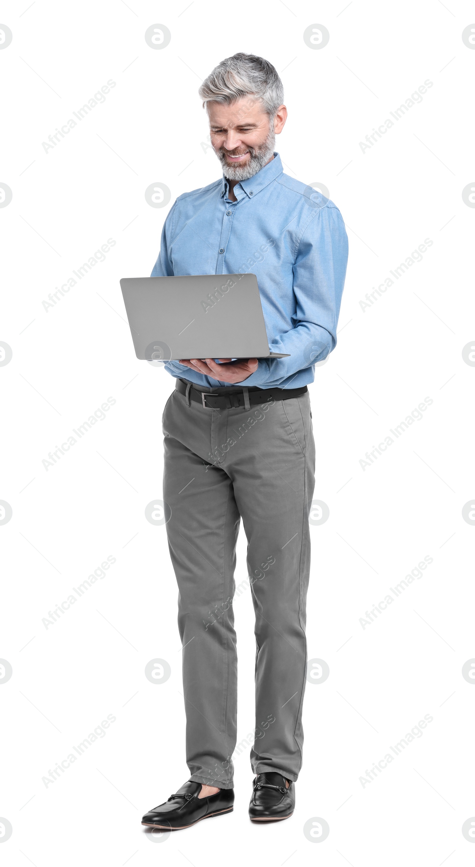 Photo of Mature businessman in stylish clothes with laptop on white background