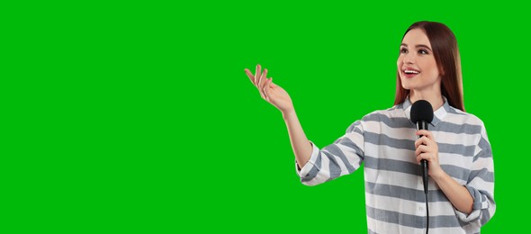 Image of Chroma key compositing. Broadcaster with microphone against green screen, banner design