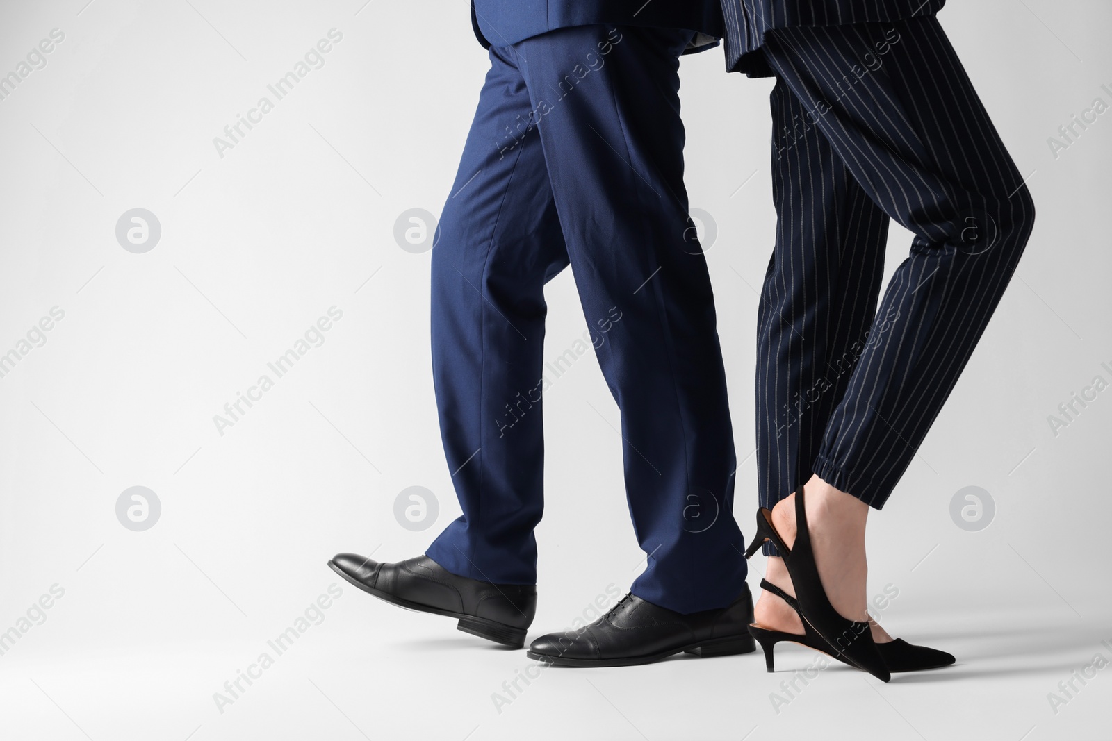 Photo of Businesswoman and businessman on white background, closeup