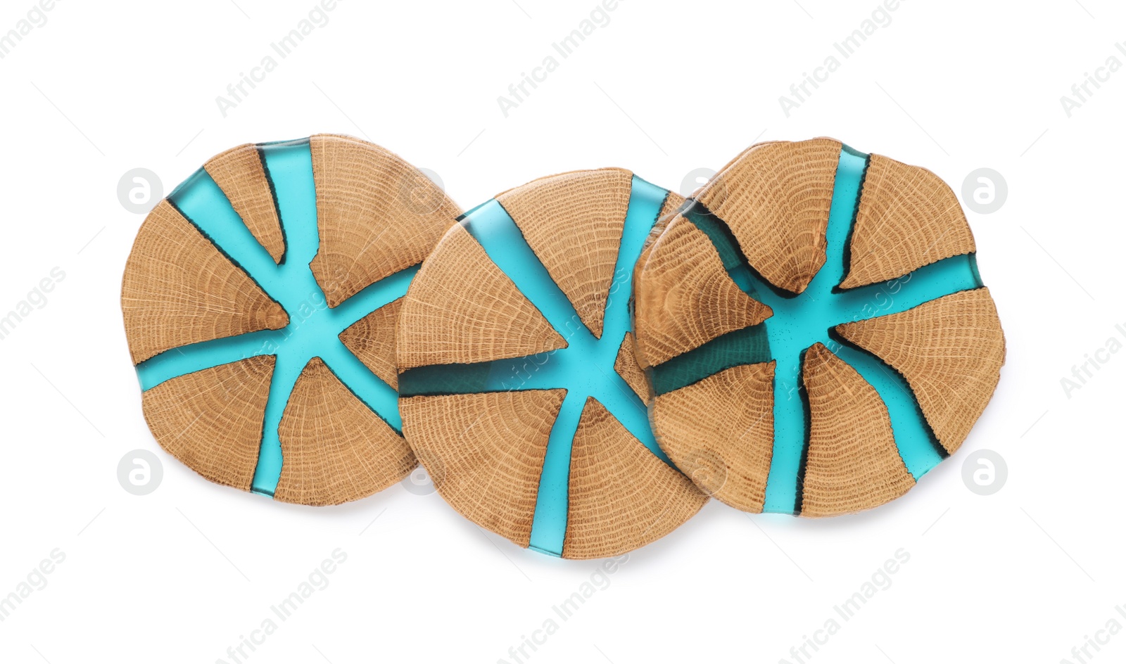 Photo of Stylish wooden cup coasters on white background, top view