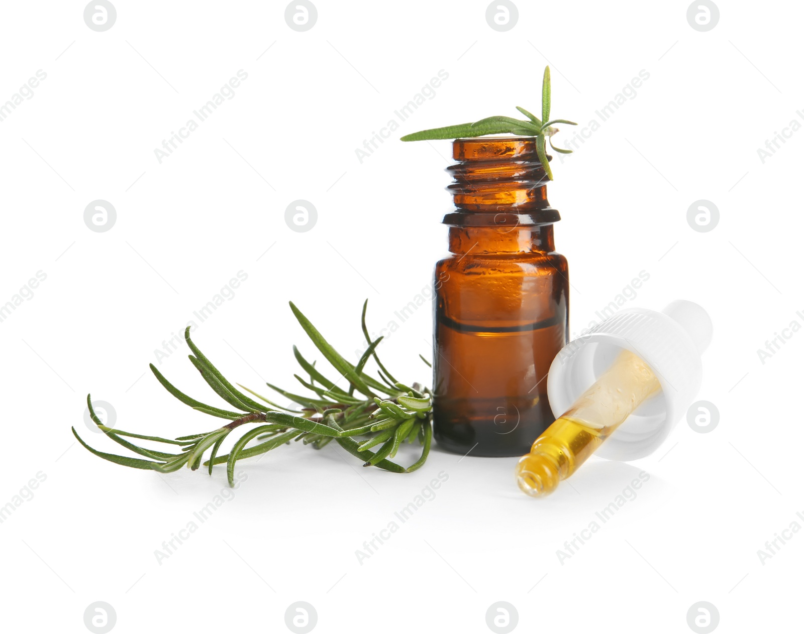 Photo of Small bottle with rosemary oil and fresh twig on white background