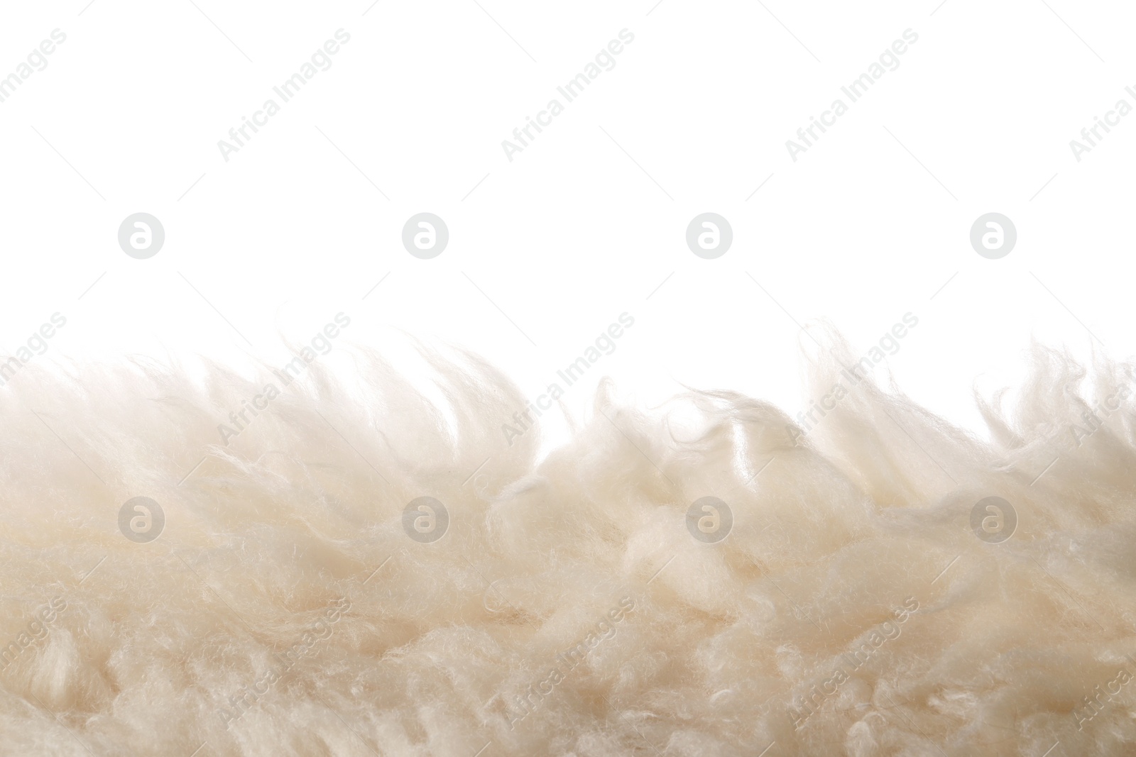 Photo of Soft beige faux fur isolated on white