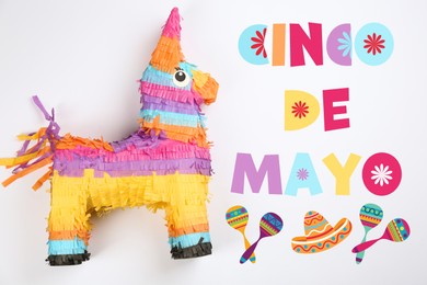 Image of Cinco de Mayo festive poster. Bright funny pinata on white background, top view 