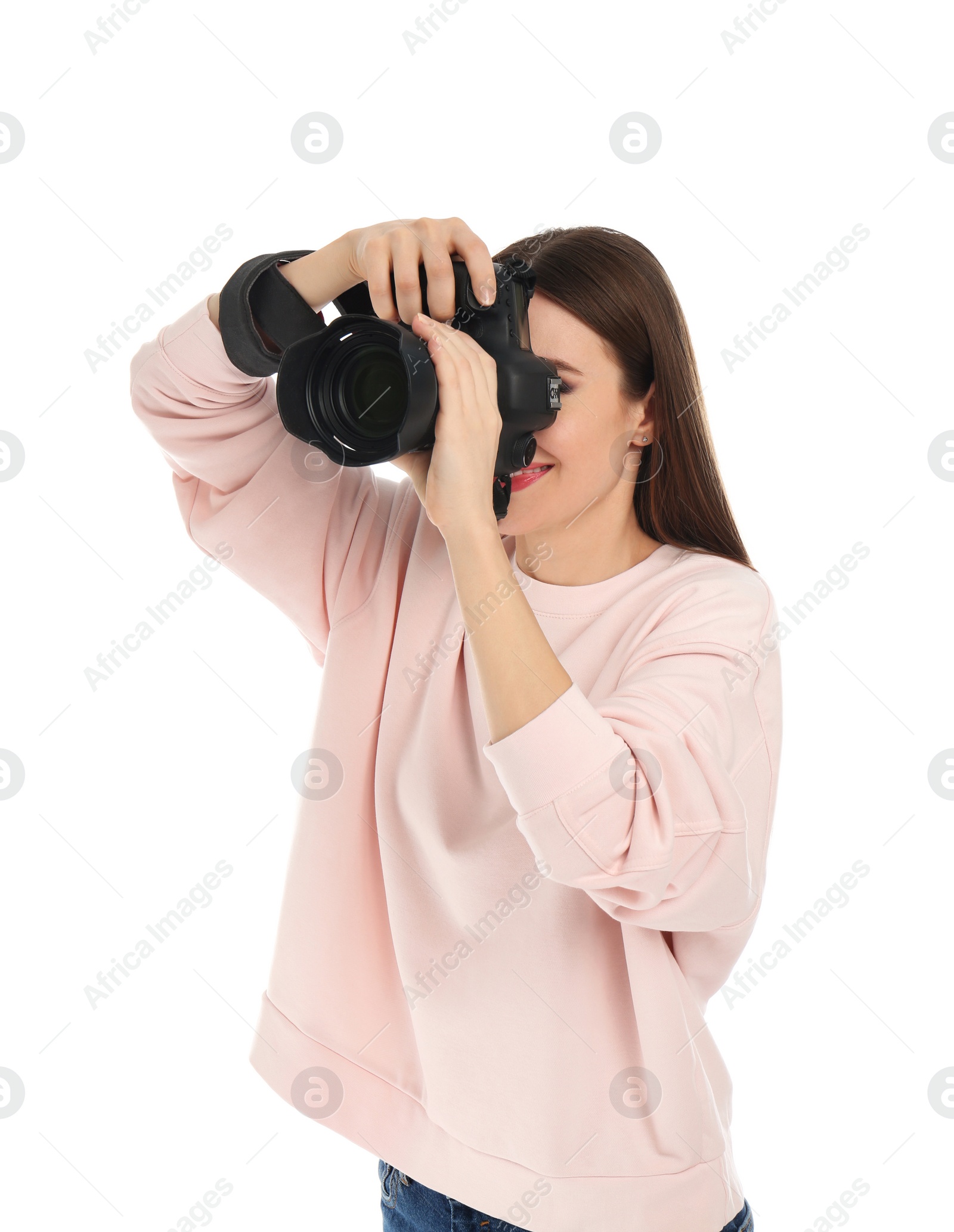 Photo of Professional photographer taking picture on white background