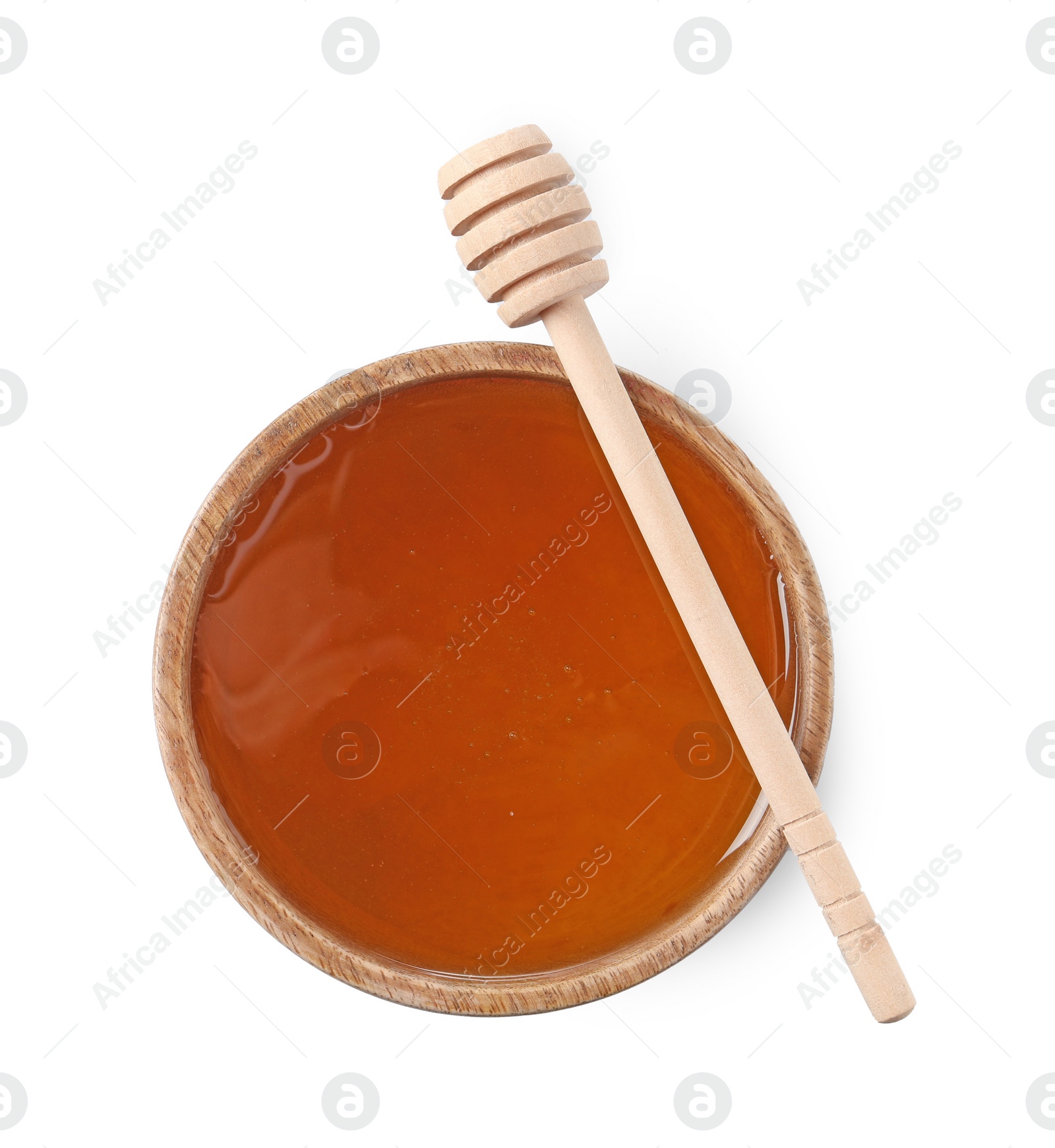 Photo of Tasty honey in bowl and dipper isolated on white, top view