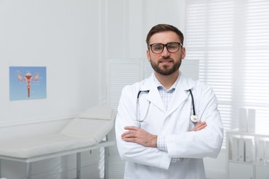Portrait of young gynecologist in modern clinic