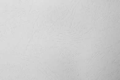 Photo of Texture of white paper sheet as background, top view