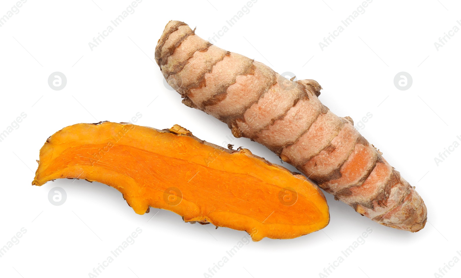 Photo of Fresh turmeric roots isolated on white, top view