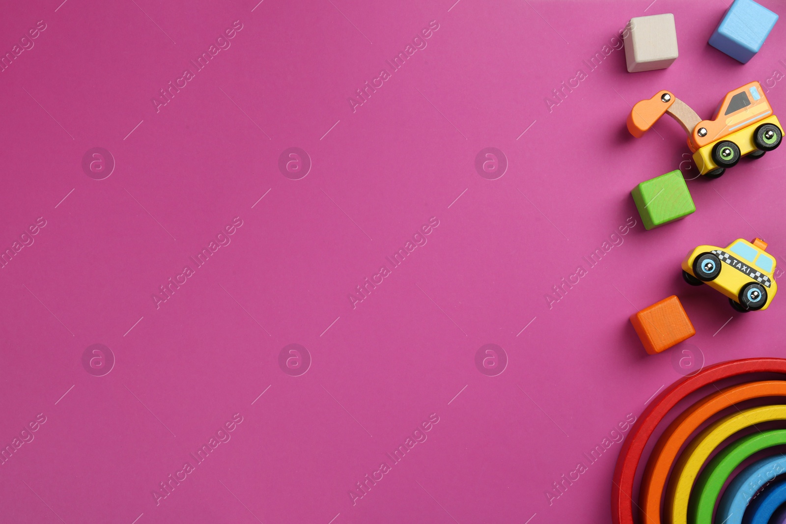 Photo of Different children's toys on magenta background, flat lay. Space for text