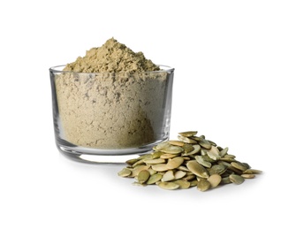 Bowl of fresh pumpkin seed flour and kernels isolated on white