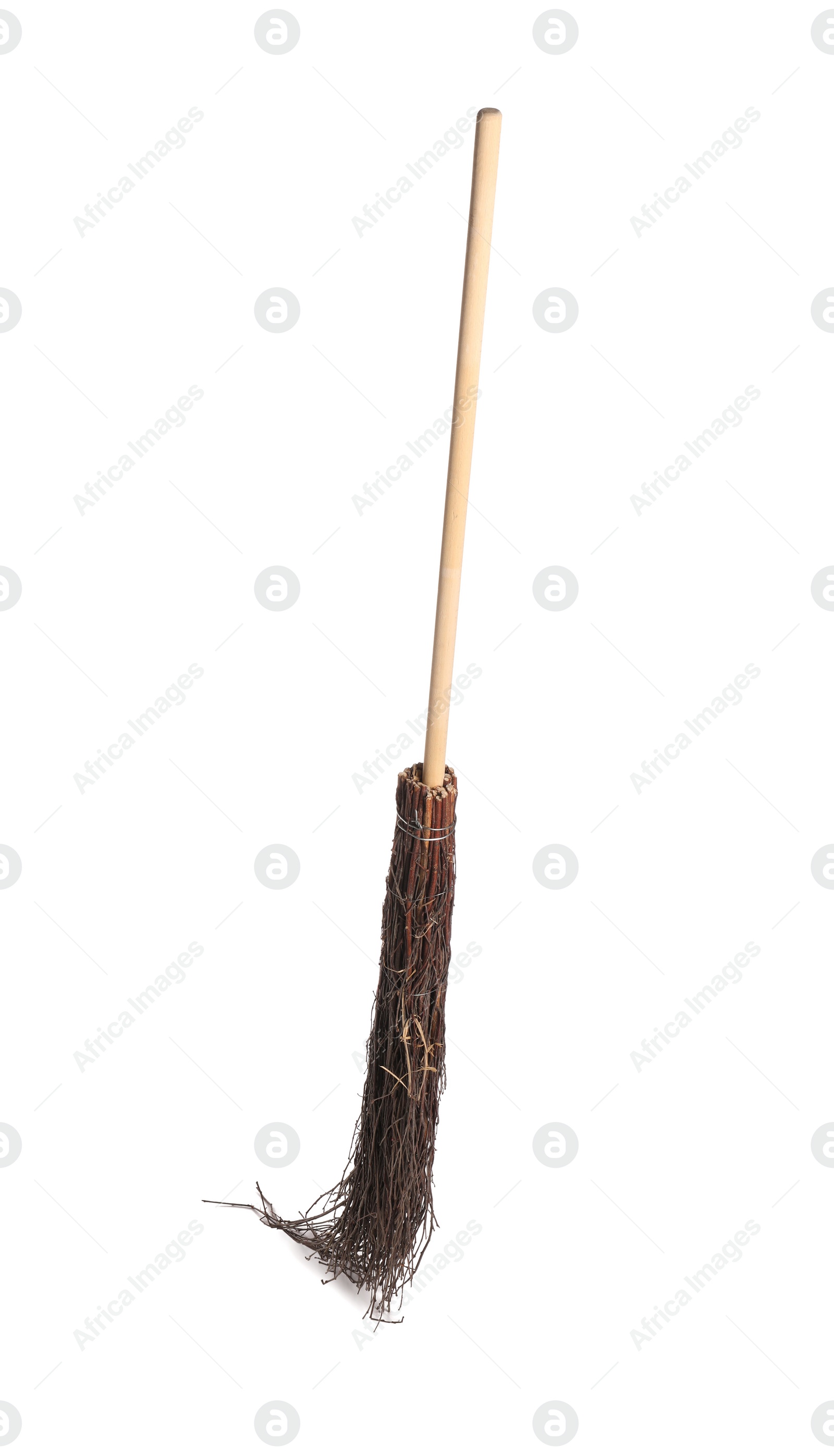 Photo of Old broom with wooden handle isolated on white