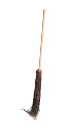 Photo of Old broom with wooden handle isolated on white