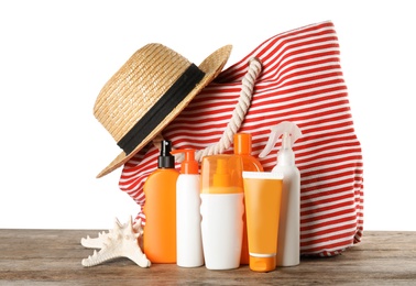 Composition with sun protection products on white background. Body care