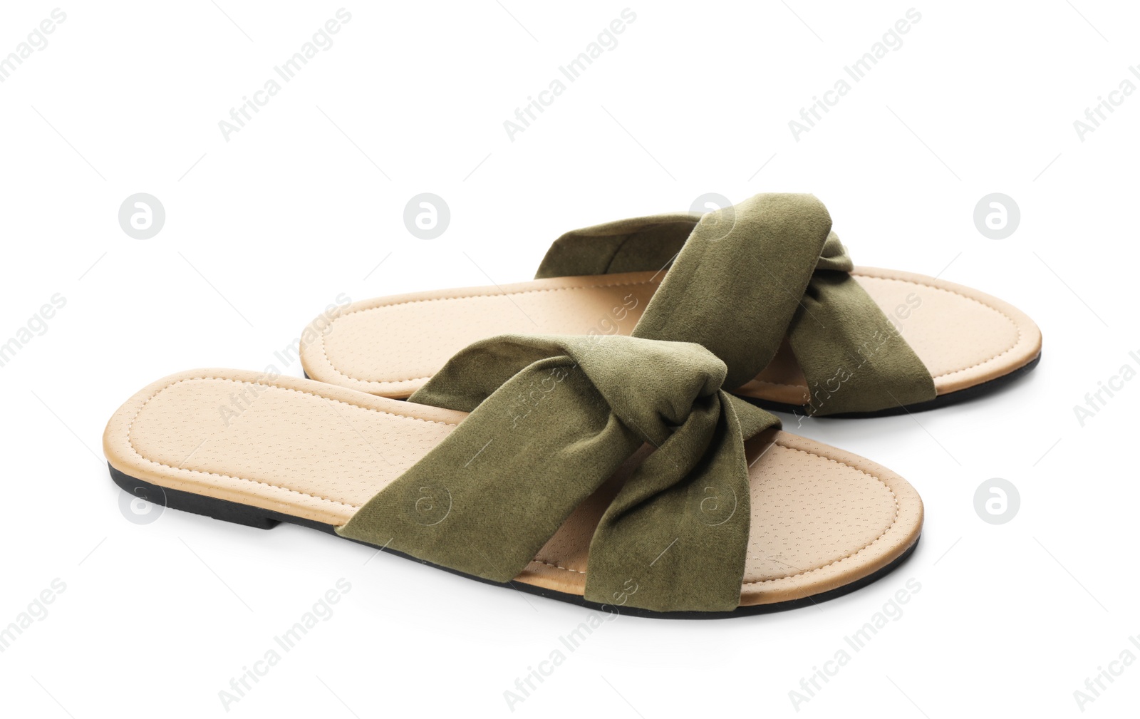 Photo of Pair of stylish slippers on white background. Beach object