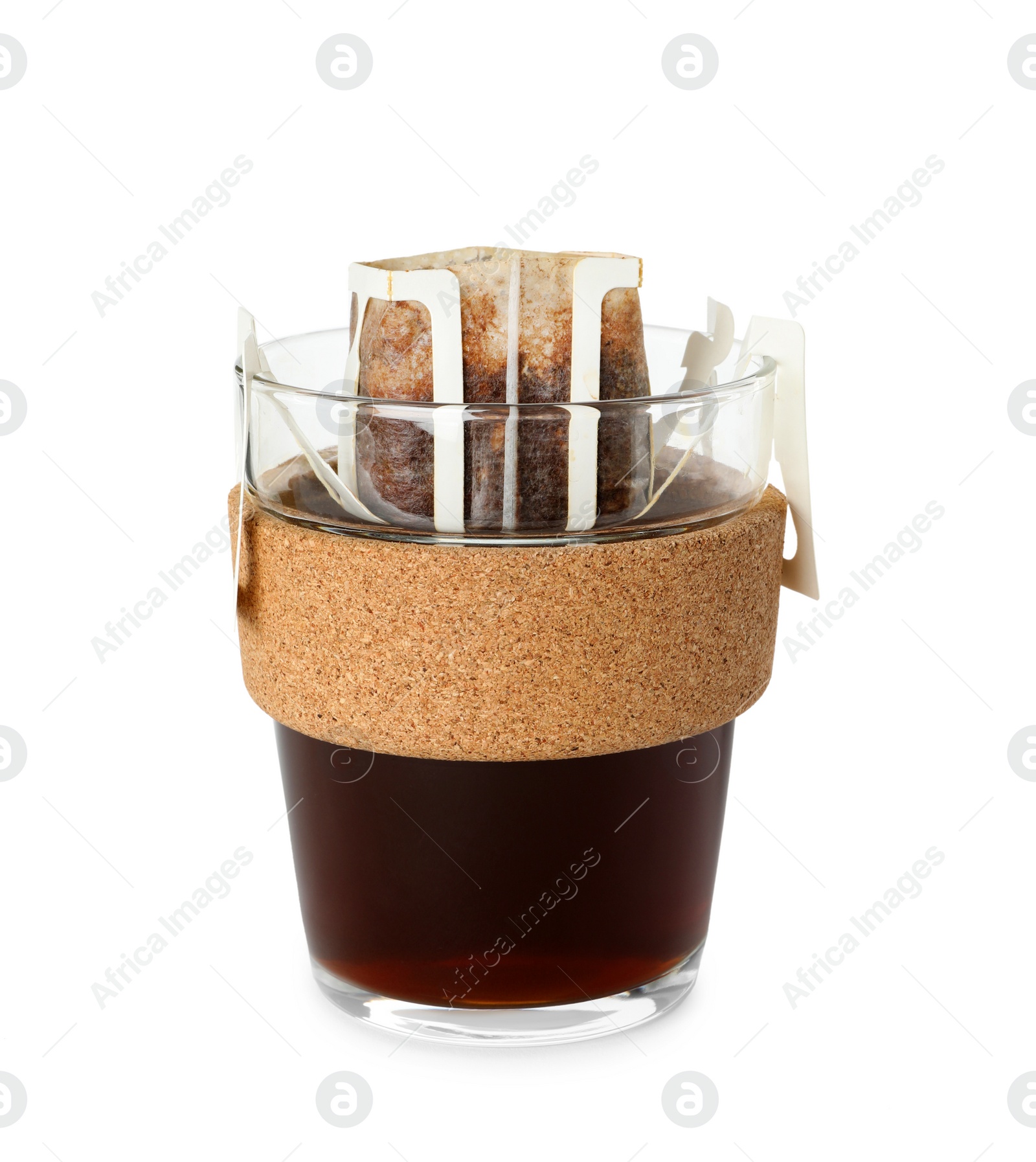 Photo of Glass cup with drip coffee bag isolated on white