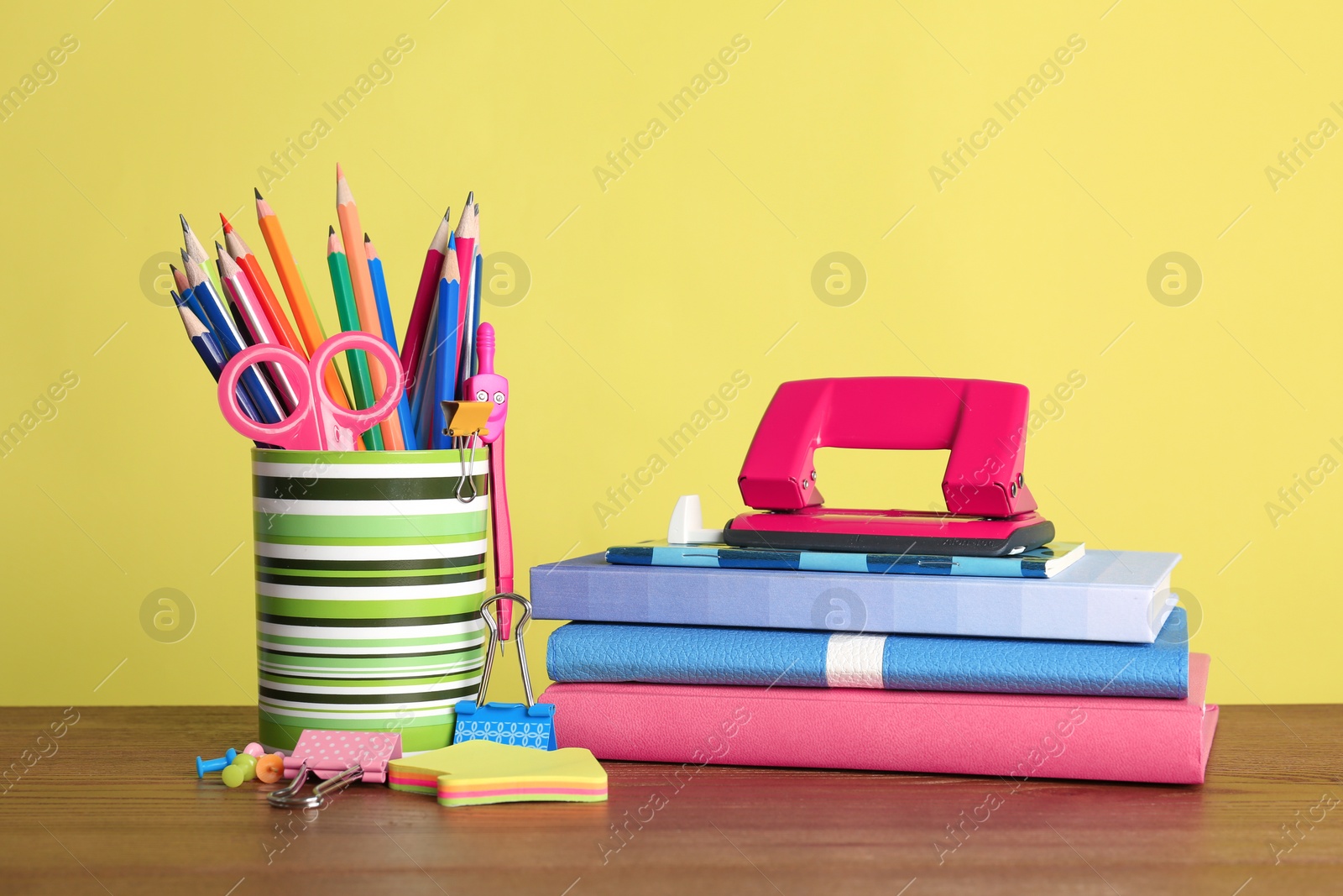 Photo of Different colorful stationery on table. Back to school