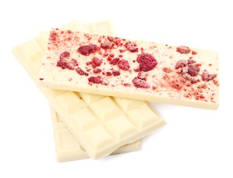 Chocolate bars with freeze dried raspberries on white background