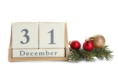 Photo of Wooden block calendar and decor on white background. Christmas countdown