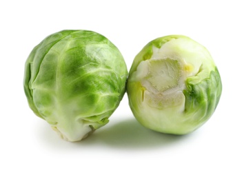 Fresh tasty Brussels sprouts on white background