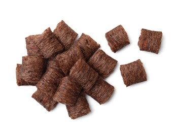 Photo of Tasty chocolate cereal pads isolated on white, top view