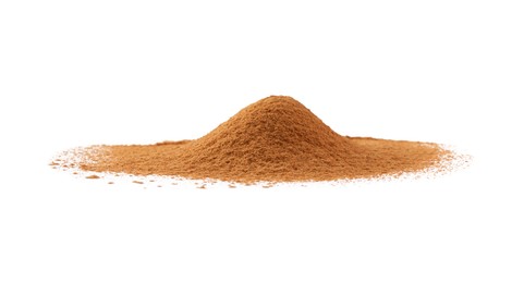 Photo of Pile of dry aromatic cinnamon powder isolated on white