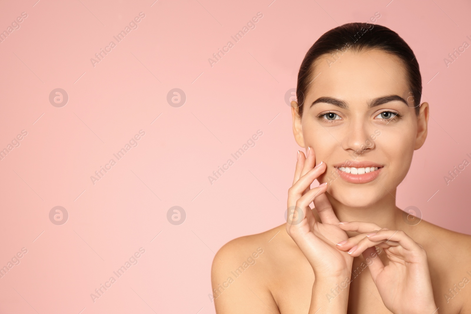 Photo of Portrait of beautiful young woman and space for text on color background. Cosmetic surgery concept