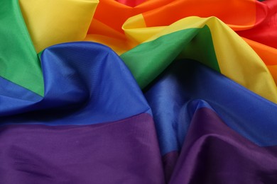 Photo of Rainbow LGBT flag as background, closeup view