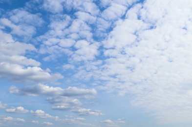 Beautiful fluffy white clouds in blue sky