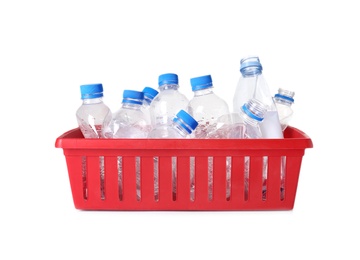 Photo of Crate with plastic bottles on white background. Trash recycling