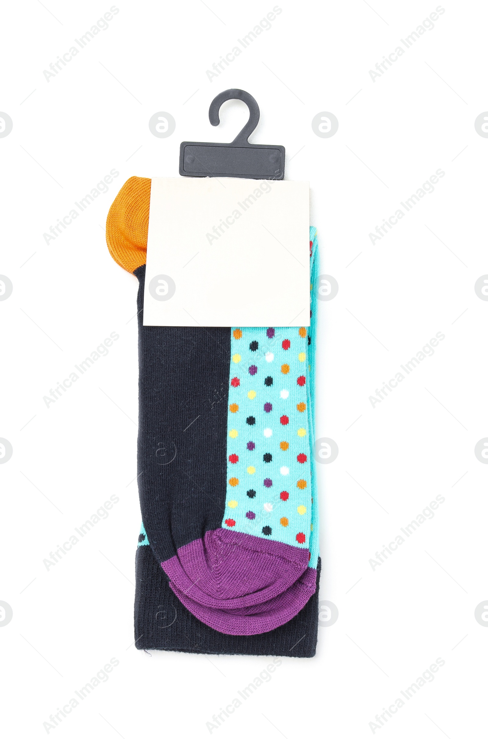 Photo of Colorful socks on white background, top view