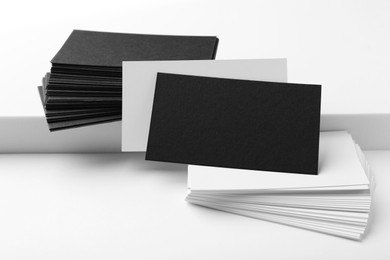 Photo of Business cards on white background. Mockup for design