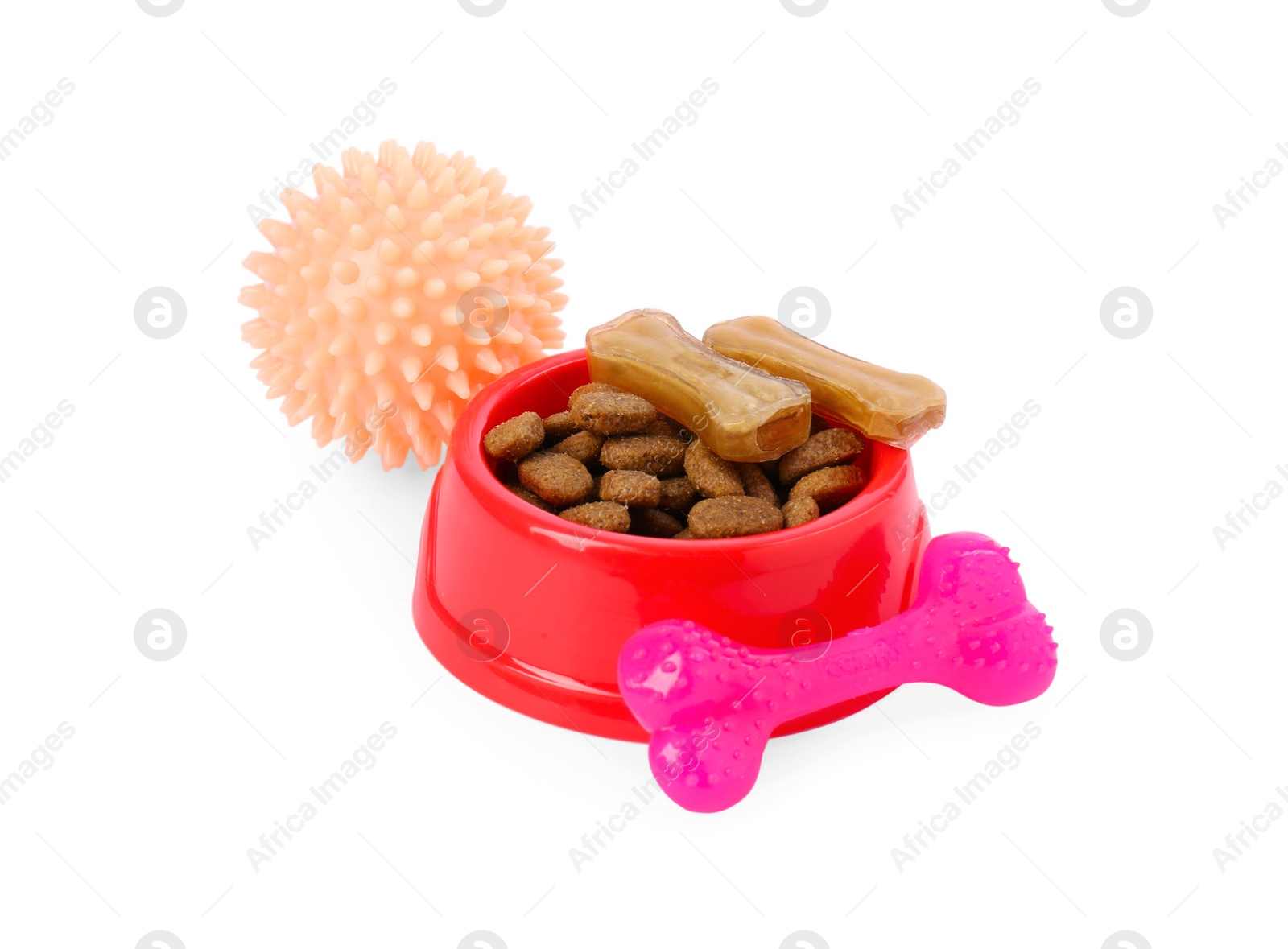 Photo of Pet dry food in bowl, treats and toys on white background. Shop assortment