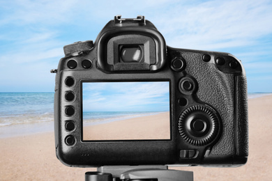 Image of Recording beautiful view of seashore on professional video camera