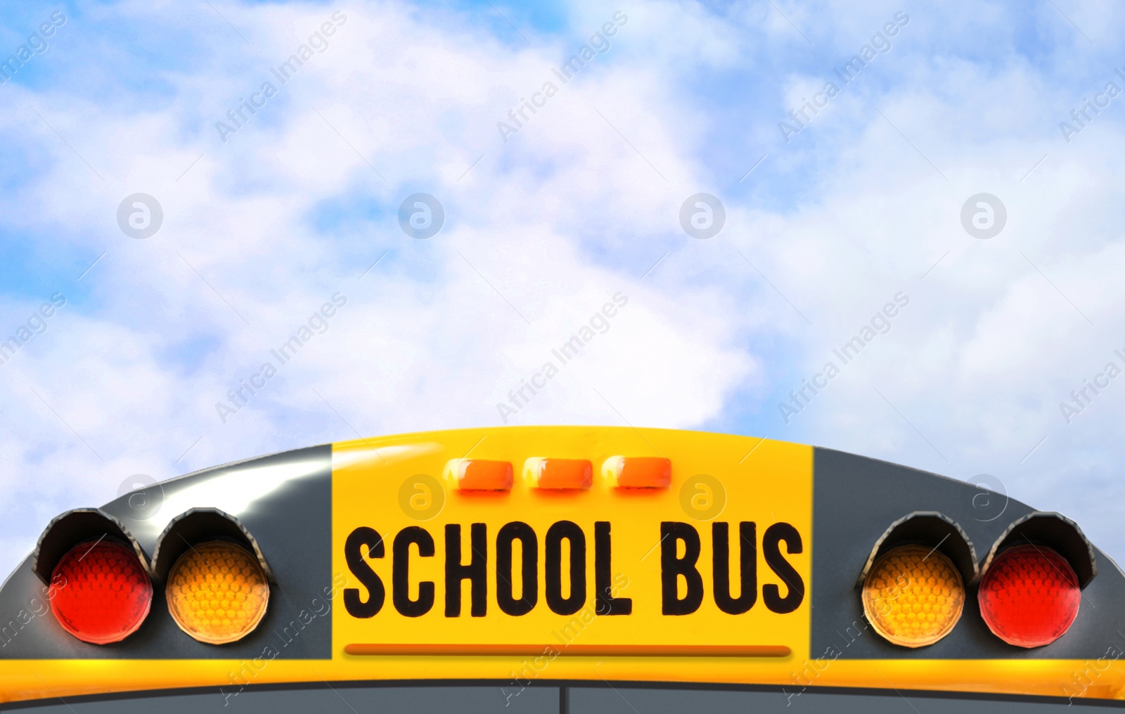 Image of Yellow school bus outdoors, closeup. Transport for students