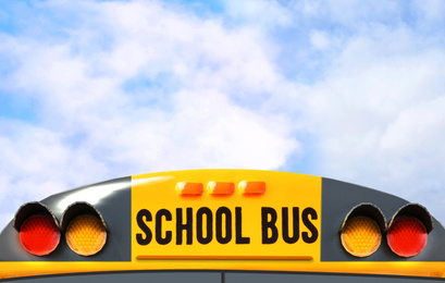Yellow school bus outdoors, closeup. Transport for students