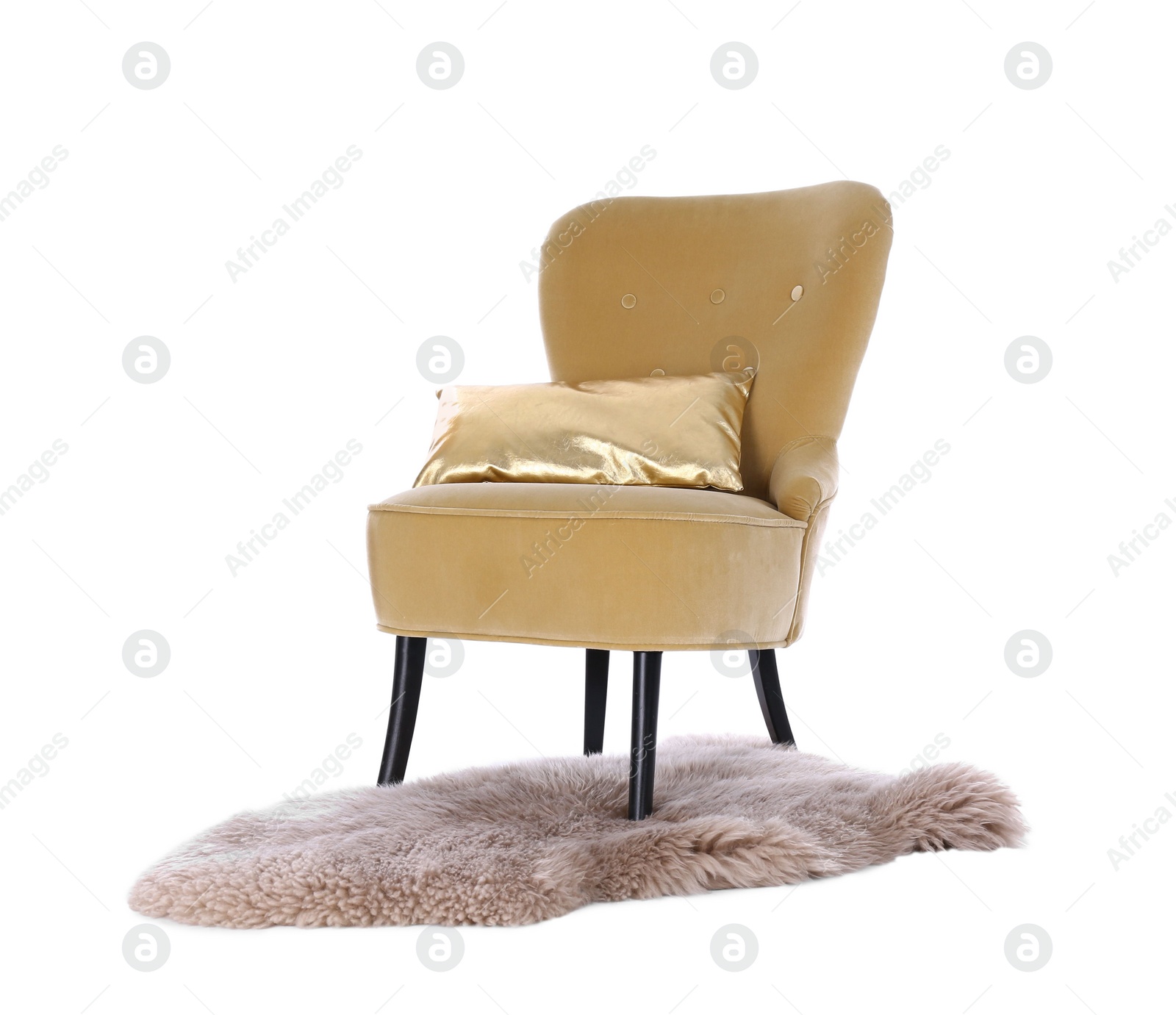 Photo of Comfortable armchair with cushion and faux fur rug isolated on white