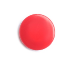 Photo of Bright red plastic magnet on white background, top view