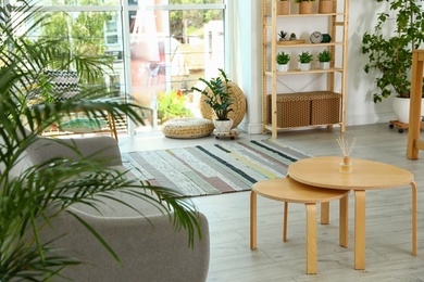 Photo of Wooden coffee table in modern living room interior