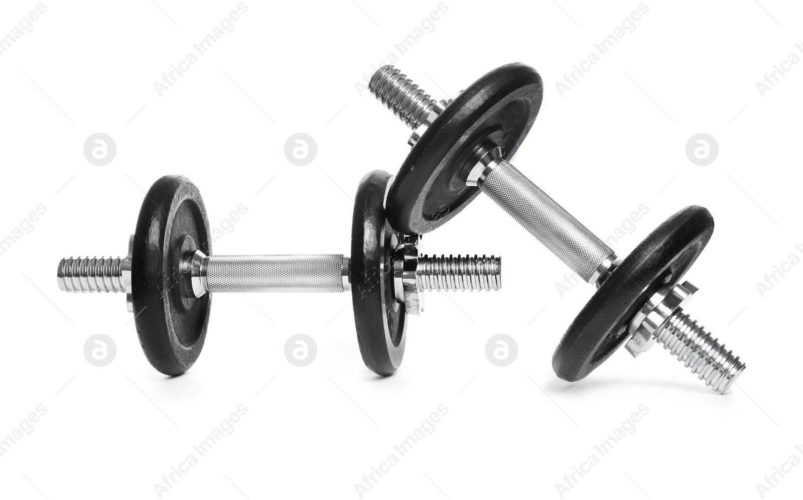 Photo of Professional dumbbells on white background. Sporting equipment