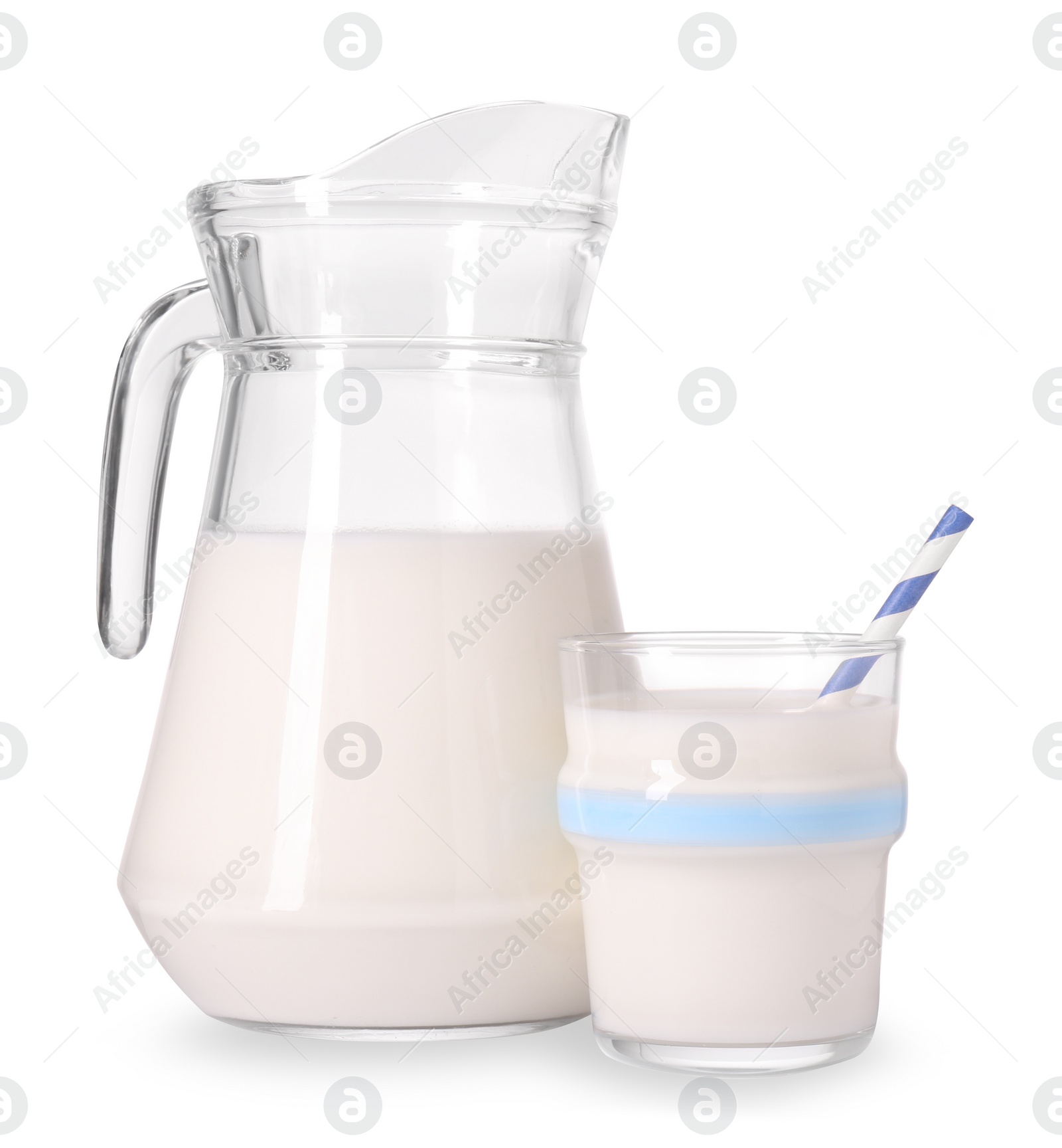 Photo of Jug and glass of fresh milk isolated on white