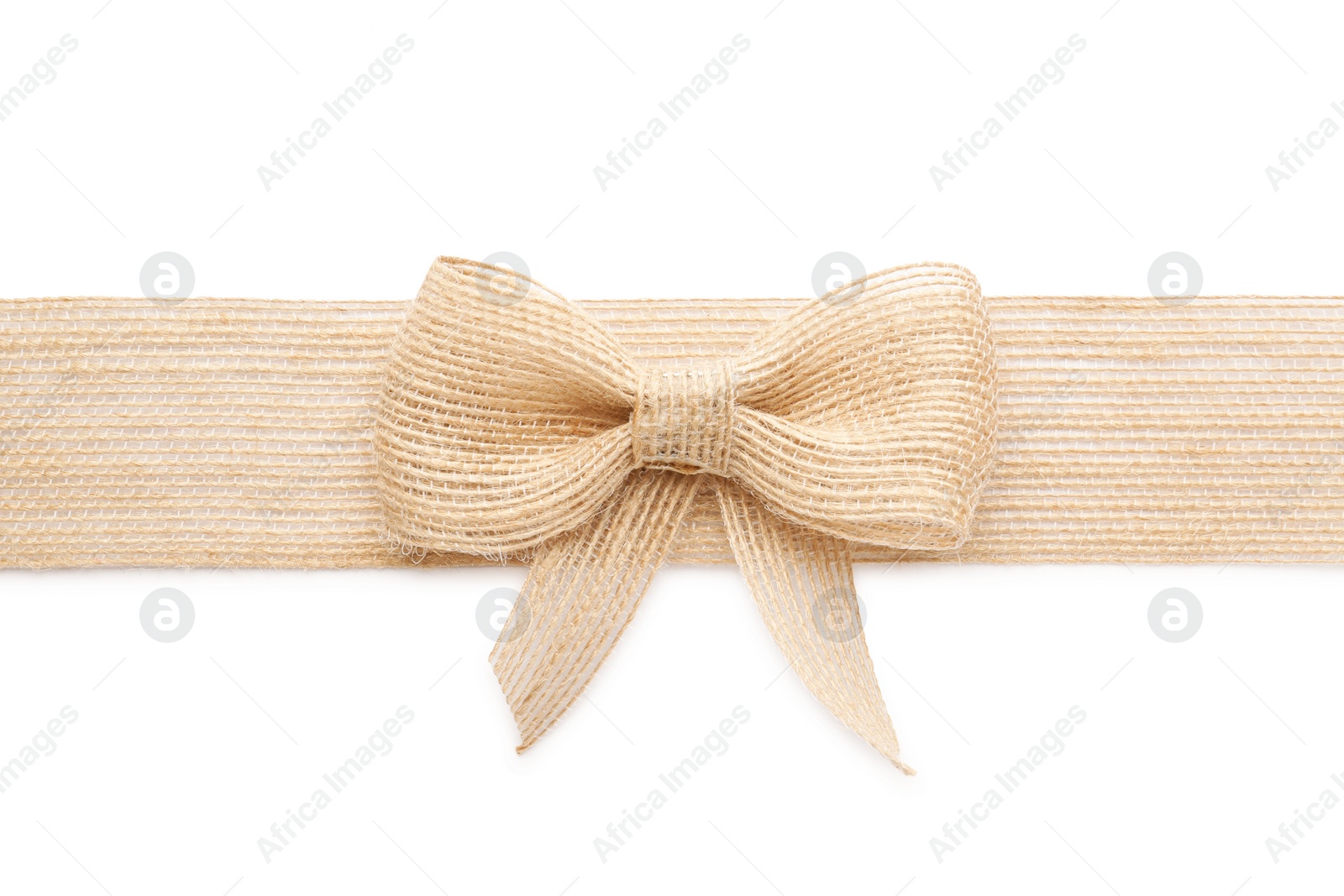 Photo of Burlap ribbon with pretty bow on white background, top view