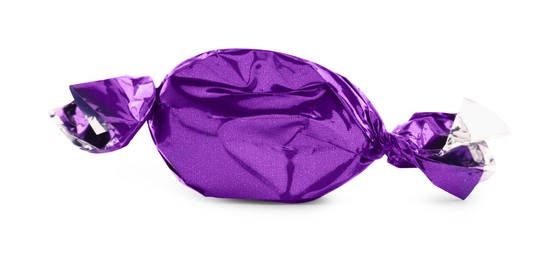 Photo of Candy in purple wrapper isolated on white