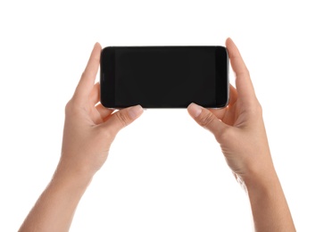 Photo of Woman holding smartphone with blank screen on white background. Mockup for design